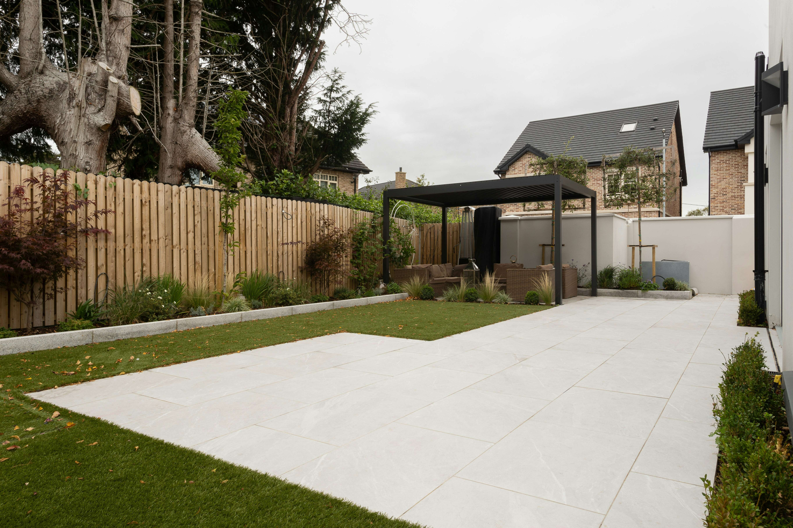 Porcelain paving & grass patio