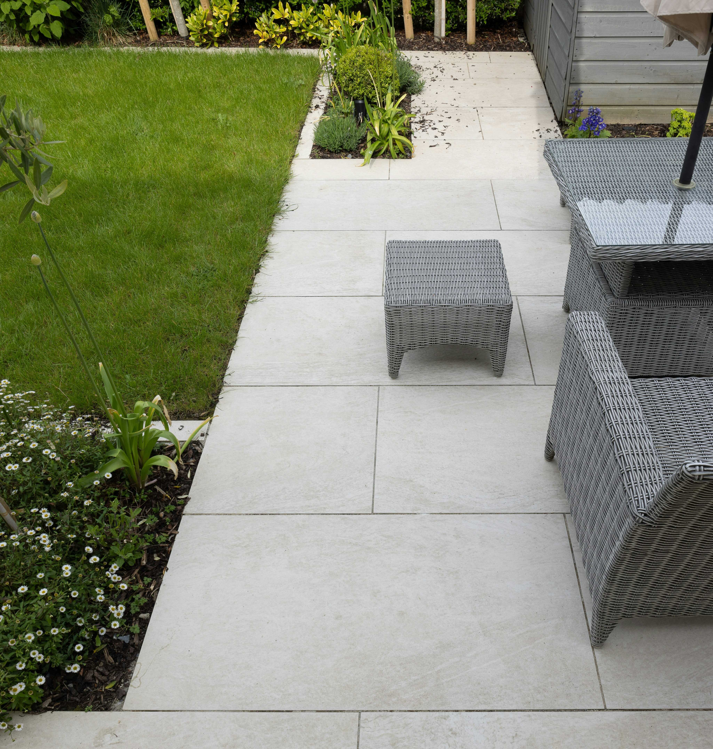 Grass vs porcelain paving - which one to choose for your garden